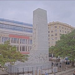 Alamo cenotaph with fencing around the perimeter