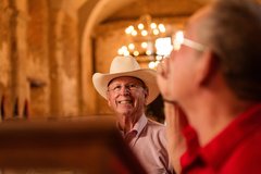 A visitor enjoying his visit to the Alamo Church.