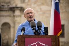 Singer Phil Collins speaking at the Alamo